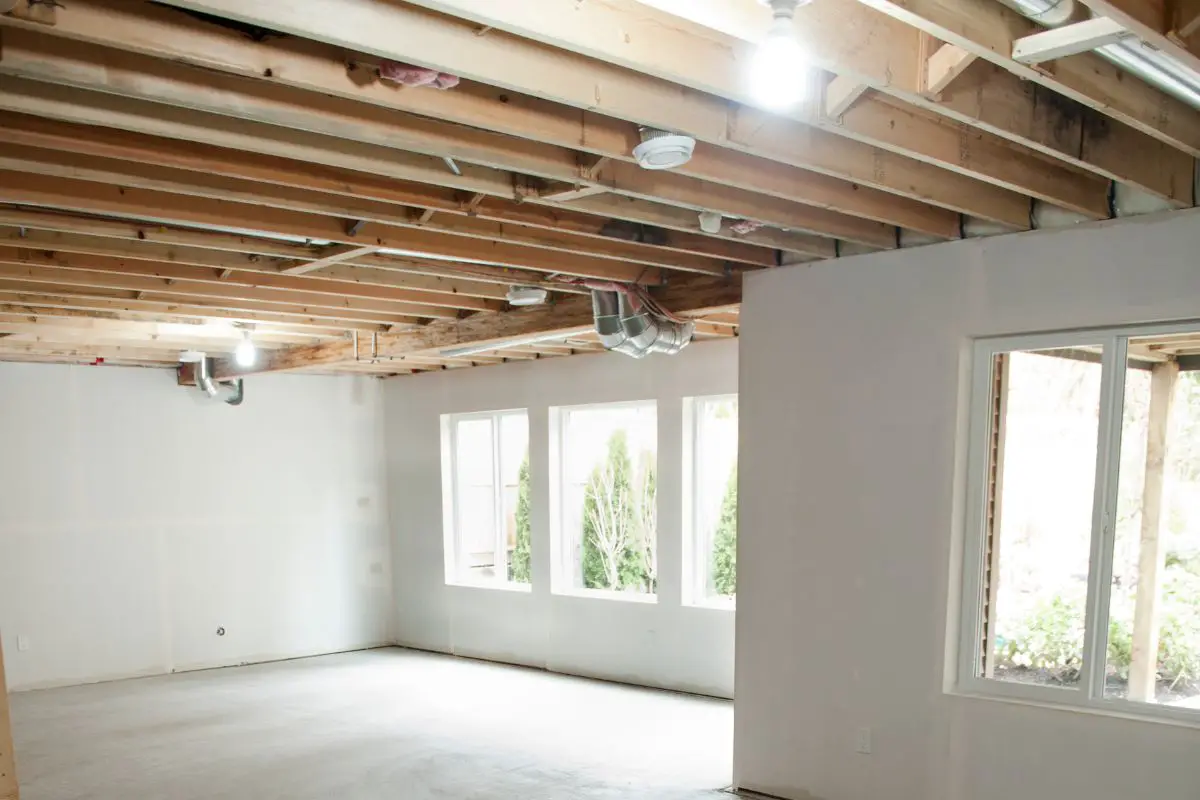 How To Paint Your Exposed Basement Ceiling Black (Full Guide!)